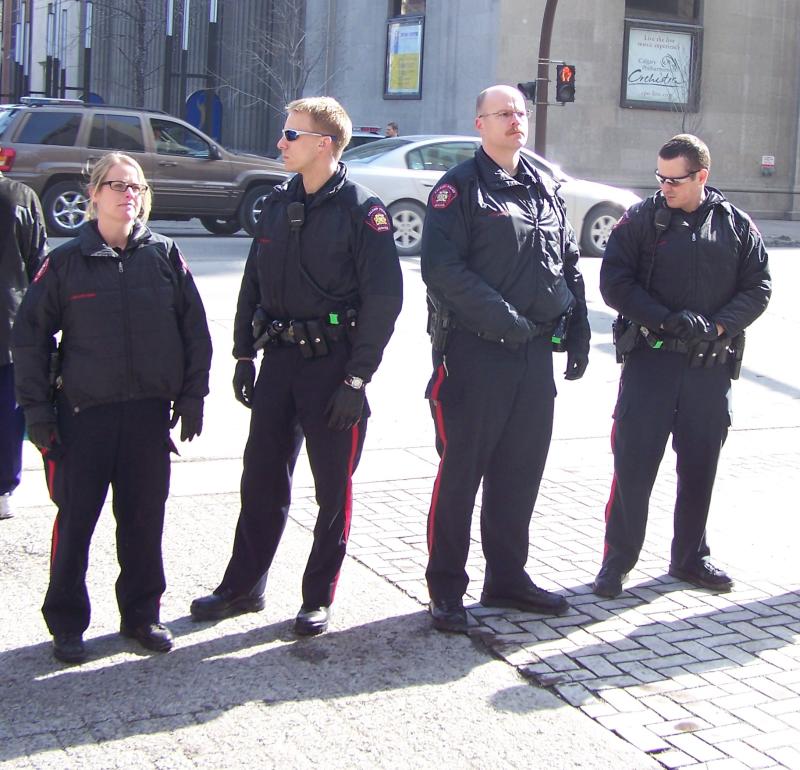 Calgary Police Service stands watch